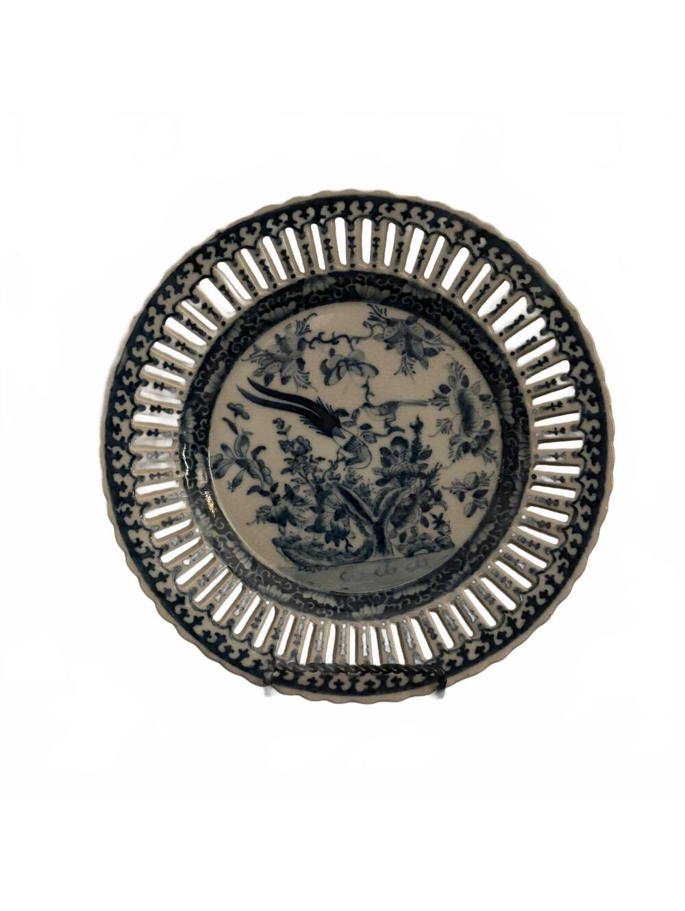 Antique blue and white porcelain reticulated decorative plate.